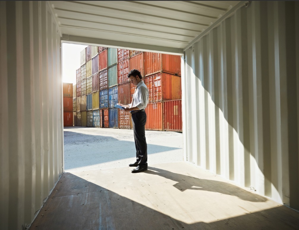 a person is doing Container Inspection